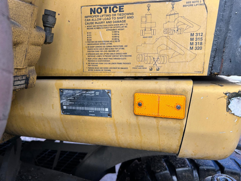 Bager na kotačima Caterpillar M312 Engcon EC20 tiltrotator: slika Bager na kotačima Caterpillar M312 Engcon EC20 tiltrotator Bager na kotačima Caterpillar M312 Engcon EC20 tiltrotator: slika Bager na kotačima Caterpillar M312 Engcon EC20 tiltrotator