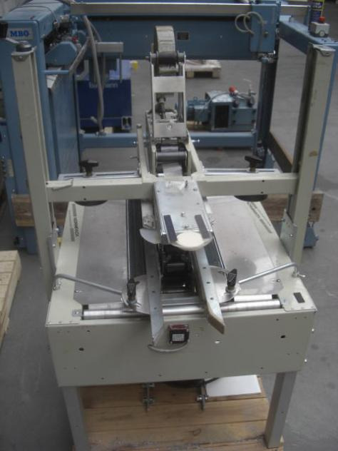 Normpack Tapemat NCG 320 automatic folding carton sealing machine - Stroj za pakiranje: slika Normpack Tapemat NCG 320 automatic folding carton sealing machine - Stroj za pakiranje Normpack Tapemat NCG 320 automatic folding carton sealing machine - Stroj za pakiranje: slika Normpack Tapemat NCG 320 automatic folding carton sealing machine - Stroj za pakiranje