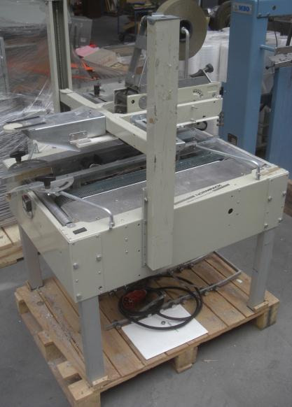 Normpack Tapemat NCG 320 automatic folding carton sealing machine - Stroj za pakiranje: slika Normpack Tapemat NCG 320 automatic folding carton sealing machine - Stroj za pakiranje Normpack Tapemat NCG 320 automatic folding carton sealing machine - Stroj za pakiranje: slika Normpack Tapemat NCG 320 automatic folding carton sealing machine - Stroj za pakiranje