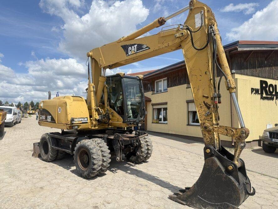 CAT M315C AC - Bager na kotačima: slika CAT M315C AC - Bager na kotačima CAT M315C AC - Bager na kotačima: slika CAT M315C AC - Bager na kotačima