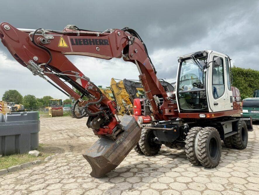 Liebherr A311 Litronic - Bager na kotačima: slika Liebherr A311 Litronic - Bager na kotačima Liebherr A311 Litronic - Bager na kotačima: slika Liebherr A311 Litronic - Bager na kotačima