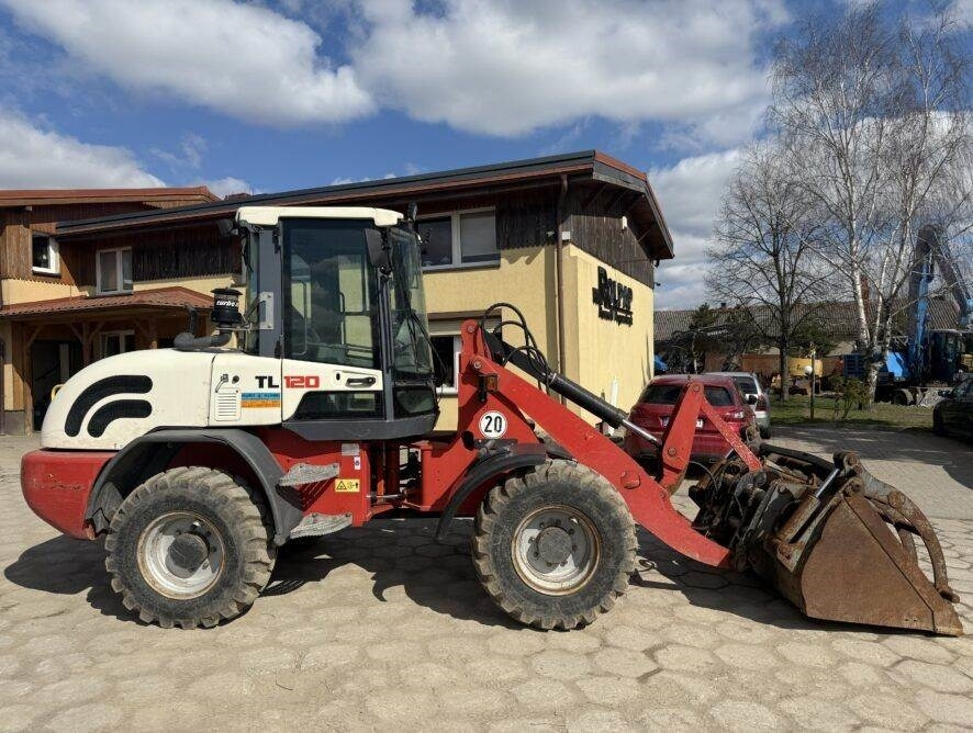 Terex TL120 - Utovarivač na kotačima: slika Terex TL120 - Utovarivač na kotačima Terex TL120 - Utovarivač na kotačima: slika Terex TL120 - Utovarivač na kotačima