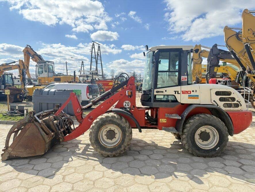 Terex TL120 - Utovarivač na kotačima: slika Terex TL120 - Utovarivač na kotačima Terex TL120 - Utovarivač na kotačima: slika Terex TL120 - Utovarivač na kotačima