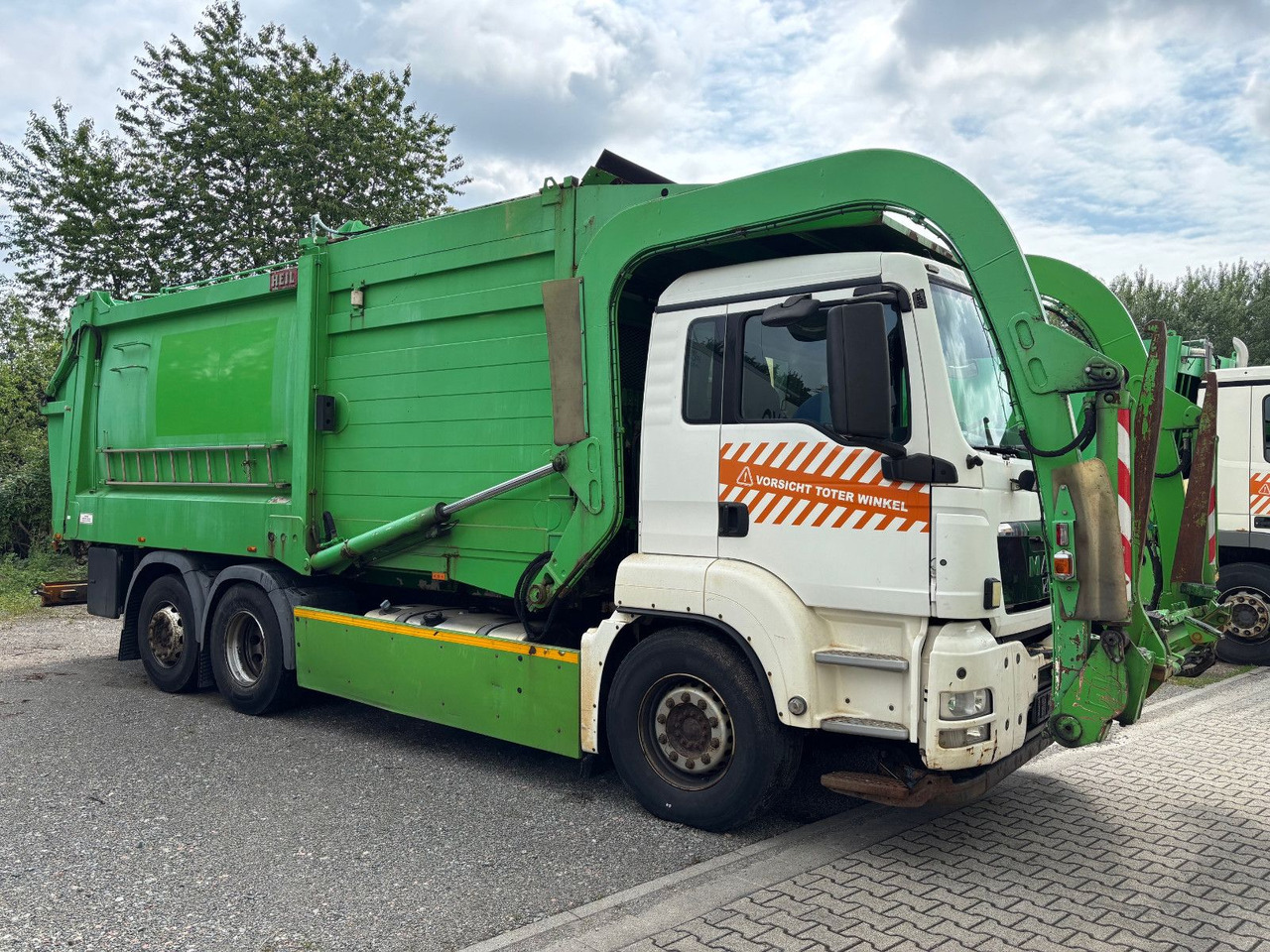 MAN TGS 26.320 EEV Heil Aufbau/Frontlader/Lift - Kamion za odvoz smeća: slika MAN TGS 26.320 EEV Heil Aufbau/Frontlader/Lift - Kamion za odvoz smeća MAN TGS 26.320 EEV Heil Aufbau/Frontlader/Lift - Kamion za odvoz smeća: slika MAN TGS 26.320 EEV Heil Aufbau/Frontlader/Lift - Kamion za odvoz smeća