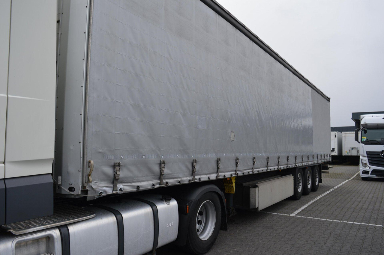 Schmitz Cargobull SCS24/L Lifting Axle - Poluprikolica s ceradom: slika Schmitz Cargobull SCS24/L Lifting Axle - Poluprikolica s ceradom Schmitz Cargobull SCS24/L Lifting Axle - Poluprikolica s ceradom: slika Schmitz Cargobull SCS24/L Lifting Axle - Poluprikolica s ceradom