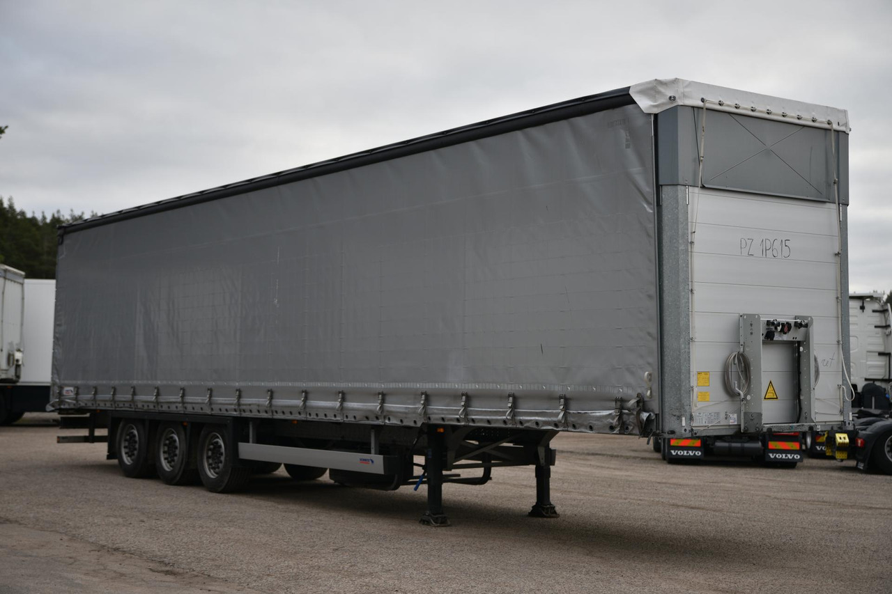 Schmitz Cargobull SCS24/L Varios - Poluprikolica s ceradom: slika Schmitz Cargobull SCS24/L Varios - Poluprikolica s ceradom Schmitz Cargobull SCS24/L Varios - Poluprikolica s ceradom: slika Schmitz Cargobull SCS24/L Varios - Poluprikolica s ceradom