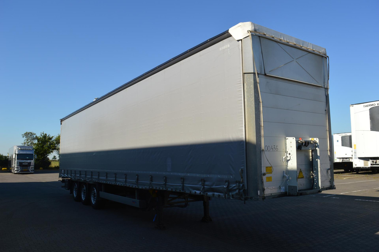 Schmitz Cargobull SCS24/L Varios - Poluprikolica s ceradom: slika Schmitz Cargobull SCS24/L Varios - Poluprikolica s ceradom Schmitz Cargobull SCS24/L Varios - Poluprikolica s ceradom: slika Schmitz Cargobull SCS24/L Varios - Poluprikolica s ceradom