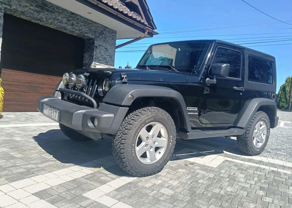 Jeep Wrangler 2.8 CRD Sport - Kabriolet: slika Jeep Wrangler 2.8 CRD Sport - Kabriolet Jeep Wrangler 2.8 CRD Sport - Kabriolet: slika Jeep Wrangler 2.8 CRD Sport - Kabriolet