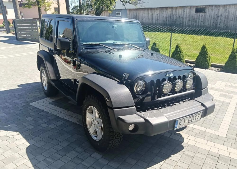 Jeep Wrangler 2.8 CRD Sport - Kabriolet: slika Jeep Wrangler 2.8 CRD Sport - Kabriolet Jeep Wrangler 2.8 CRD Sport - Kabriolet: slika Jeep Wrangler 2.8 CRD Sport - Kabriolet