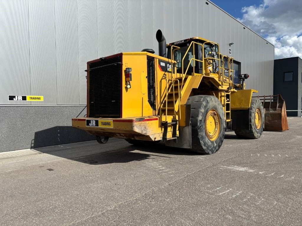 CAT 988 H - Utovarivač na kotačima: slika CAT 988 H - Utovarivač na kotačima CAT 988 H - Utovarivač na kotačima: slika CAT 988 H - Utovarivač na kotačima