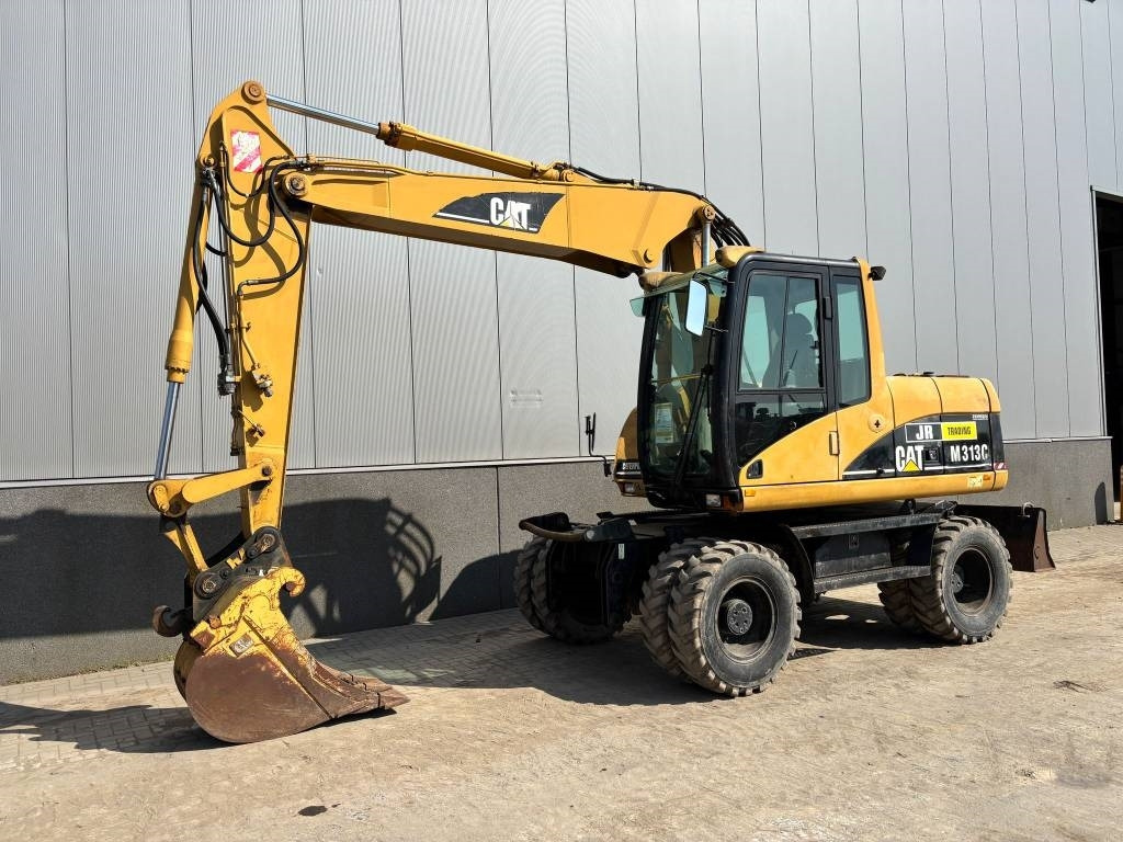 CAT M 313 C (Low verified hours) - Bager na kotačima: slika CAT M 313 C (Low verified hours) - Bager na kotačima CAT M 313 C (Low verified hours) - Bager na kotačima: slika CAT M 313 C (Low verified hours) - Bager na kotačima