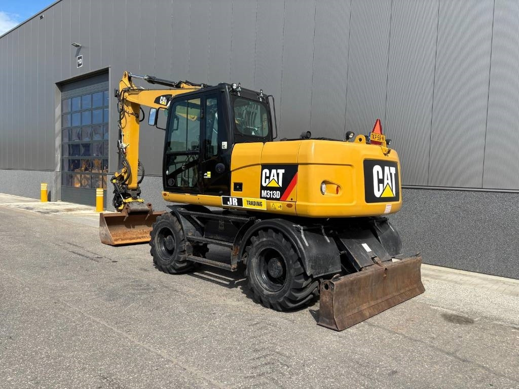 CAT M 313 D - Bager na kotačima: slika CAT M 313 D - Bager na kotačima CAT M 313 D - Bager na kotačima: slika CAT M 313 D - Bager na kotačima