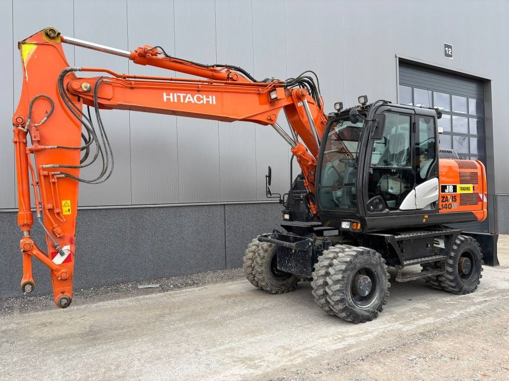 Hitachi ZX 140 W-5B - Bager na kotačima: slika Hitachi ZX 140 W-5B - Bager na kotačima Hitachi ZX 140 W-5B - Bager na kotačima: slika Hitachi ZX 140 W-5B - Bager na kotačima