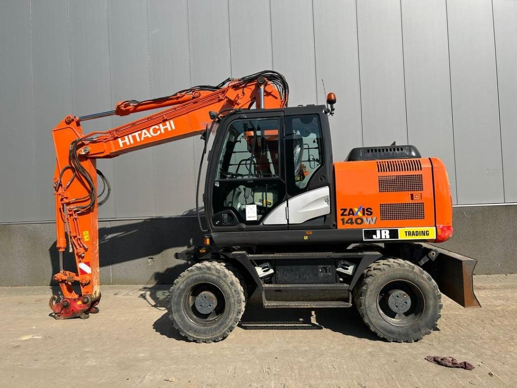 Hitachi ZX 140 W-5B - Bager na kotačima: slika Hitachi ZX 140 W-5B - Bager na kotačima Hitachi ZX 140 W-5B - Bager na kotačima: slika Hitachi ZX 140 W-5B - Bager na kotačima