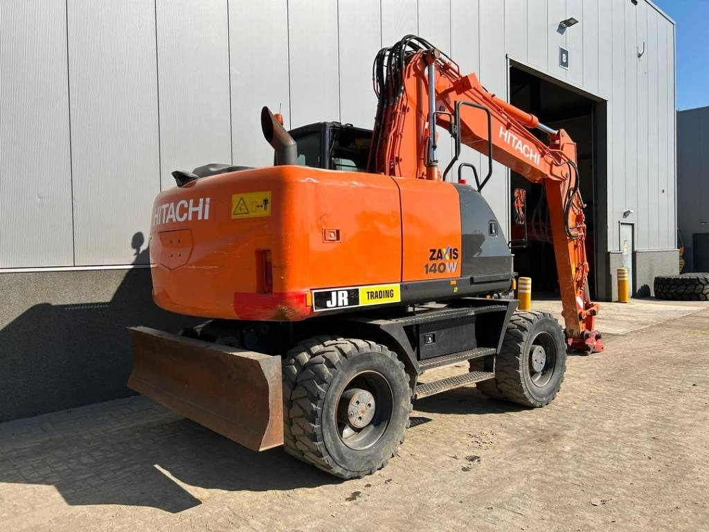 Hitachi ZX 140 W-5B - Bager na kotačima: slika Hitachi ZX 140 W-5B - Bager na kotačima Hitachi ZX 140 W-5B - Bager na kotačima: slika Hitachi ZX 140 W-5B - Bager na kotačima
