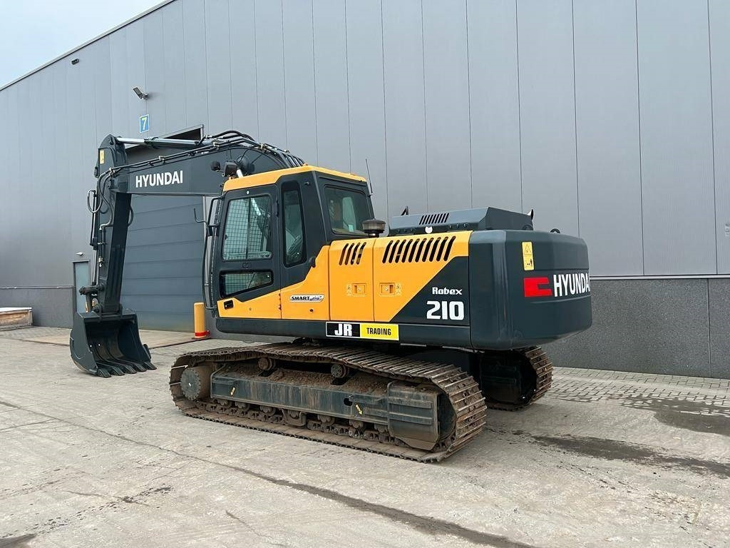 Hyundai R 210 - Bager gusjeničar: slika Hyundai R 210 - Bager gusjeničar Hyundai R 210 - Bager gusjeničar: slika Hyundai R 210 - Bager gusjeničar