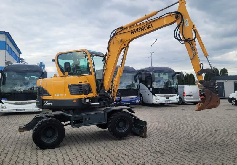 Hyundai ROBEX 55W-9 EXCAVATOR / SPROWADZONY Z FRANCJI - Bager na kotačima: slika Hyundai ROBEX 55W-9 EXCAVATOR / SPROWADZONY Z FRANCJI - Bager na kotačima Hyundai ROBEX 55W-9 EXCAVATOR / SPROWADZONY Z FRANCJI - Bager na kotačima: slika Hyundai ROBEX 55W-9 EXCAVATOR / SPROWADZONY Z FRANCJI - Bager na kotačima