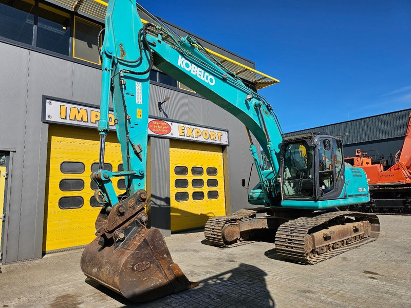 Kobelco SK210LC-9 - Bager gusjeničar: slika Kobelco SK210LC-9 - Bager gusjeničar Kobelco SK210LC-9 - Bager gusjeničar: slika Kobelco SK210LC-9 - Bager gusjeničar