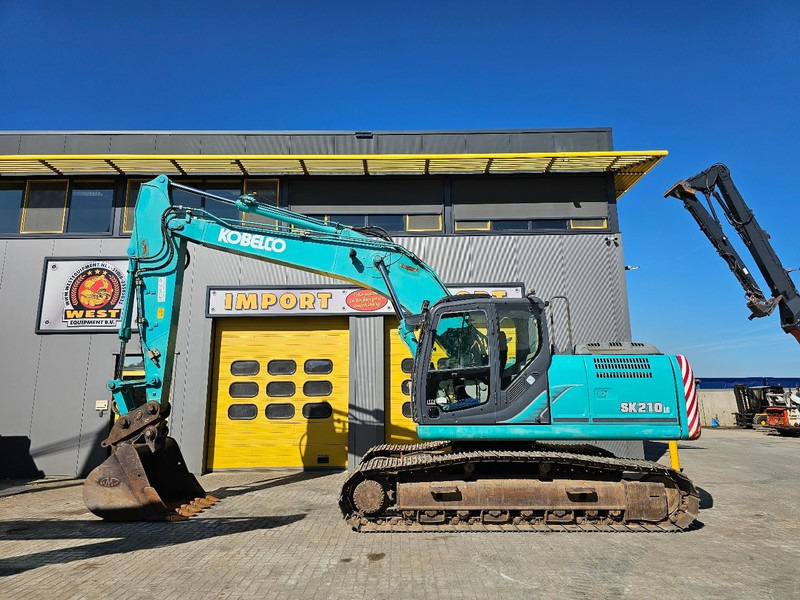Kobelco SK210LC-9 - Bager gusjeničar: slika Kobelco SK210LC-9 - Bager gusjeničar Kobelco SK210LC-9 - Bager gusjeničar: slika Kobelco SK210LC-9 - Bager gusjeničar