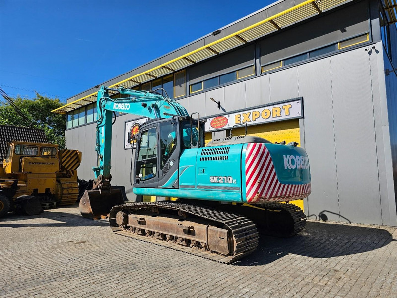 Kobelco SK210LC-9 - Bager gusjeničar: slika Kobelco SK210LC-9 - Bager gusjeničar Kobelco SK210LC-9 - Bager gusjeničar: slika Kobelco SK210LC-9 - Bager gusjeničar