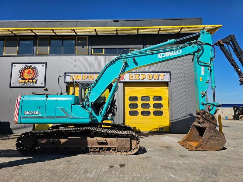 Kobelco SK210LC-9 - Bager gusjeničar: slika Kobelco SK210LC-9 - Bager gusjeničar Kobelco SK210LC-9 - Bager gusjeničar: slika Kobelco SK210LC-9 - Bager gusjeničar
