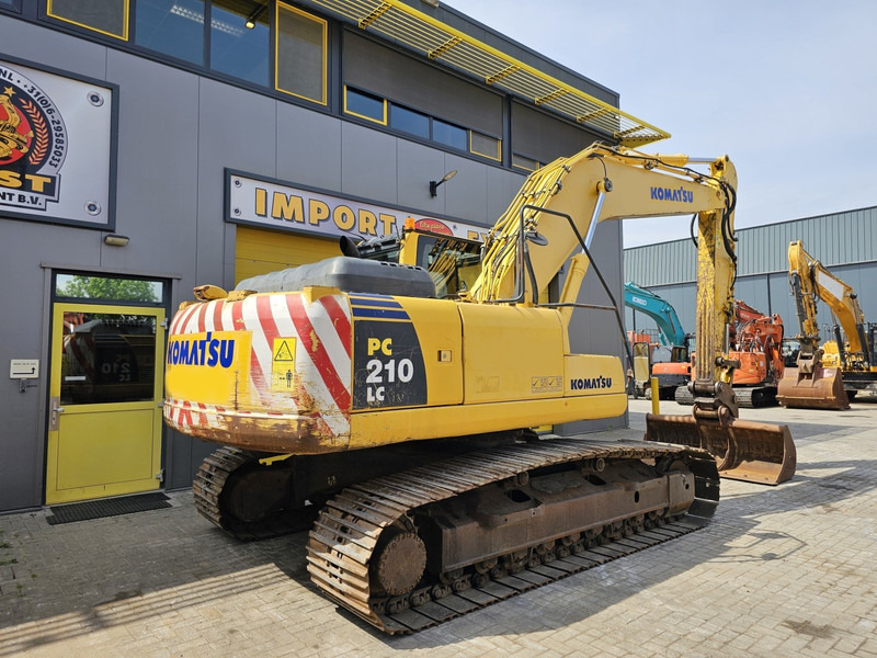 Komatsu PC210LC-8 - Bager gusjeničar: slika Komatsu PC210LC-8 - Bager gusjeničar Komatsu PC210LC-8 - Bager gusjeničar: slika Komatsu PC210LC-8 - Bager gusjeničar