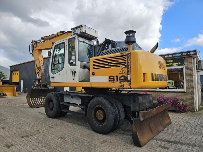 Liebherr A914 - Bager na kotačima: slika Liebherr A914 - Bager na kotačima Liebherr A914 - Bager na kotačima: slika Liebherr A914 - Bager na kotačima