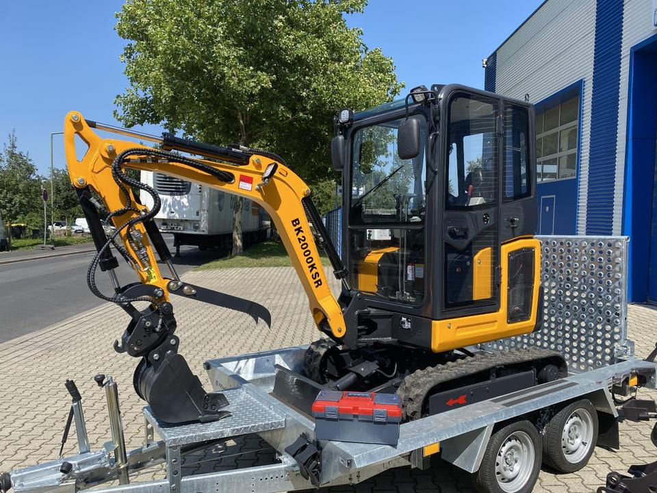 Minibagger BK2000KSR + Tieflader + Zubehör *INKL.19% MWST*BERGER KRAUS*YANMAR*SCHWENKARM* VERSTELLFAHRWERK* - Mini bager, Prikolica: slika Minibagger BK2000KSR + Tieflader + Zubehör *INKL.19% MWST*BERGER KRAUS*YANMAR*SCHWENKARM* VERSTELLFAHRWERK* - Mini bager, Prikolica Minibagger BK2000KSR + Tieflader + Zubehör *INKL.19% MWST*BERGER KRAUS*YANMAR*SCHWENKARM* VERSTELLFAHRWERK* - Mini bager, Prikolica: slika Minibagger BK2000KSR + Tieflader + Zubehör *INKL.19% MWST*BERGER KRAUS*YANMAR*SCHWENKARM* VERSTELLFAHRWERK* - Mini bager, Prikolica