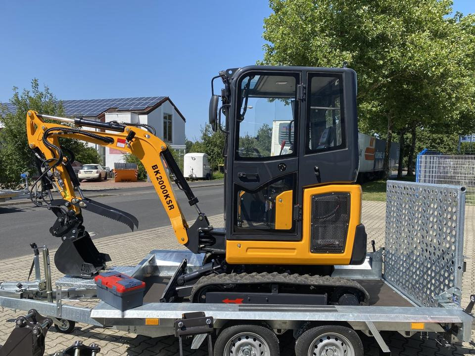 Minibagger BK2000KSR + Tieflader + Zubehör *INKL.19% MWST*BERGER KRAUS*YANMAR*SCHWENKARM* VERSTELLFAHRWERK* - Mini bager, Prikolica: slika Minibagger BK2000KSR + Tieflader + Zubehör *INKL.19% MWST*BERGER KRAUS*YANMAR*SCHWENKARM* VERSTELLFAHRWERK* - Mini bager, Prikolica Minibagger BK2000KSR + Tieflader + Zubehör *INKL.19% MWST*BERGER KRAUS*YANMAR*SCHWENKARM* VERSTELLFAHRWERK* - Mini bager, Prikolica: slika Minibagger BK2000KSR + Tieflader + Zubehör *INKL.19% MWST*BERGER KRAUS*YANMAR*SCHWENKARM* VERSTELLFAHRWERK* - Mini bager, Prikolica