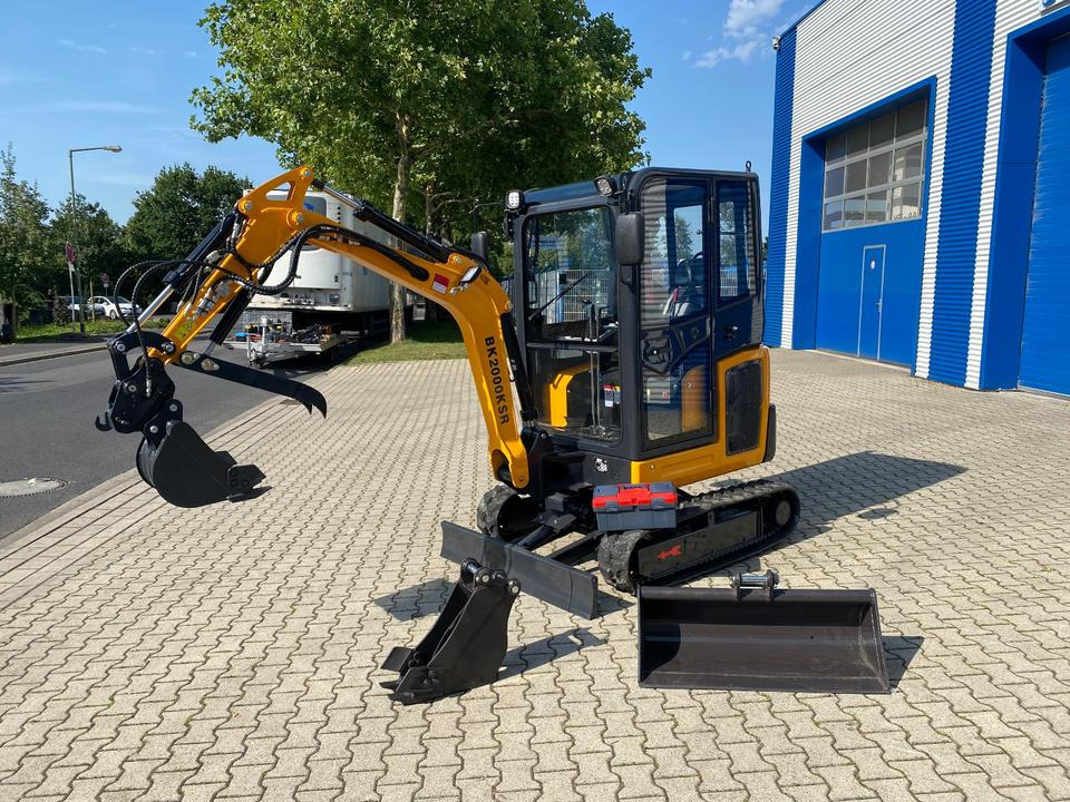 Minibagger BK2000KSR inkl. Schaufelpaket *INKL.19% MWST*BERGER KRAUS*YANMAR*SCHWENKARM* VERSTELLFAHRWERK* - Mini bager: slika Minibagger BK2000KSR inkl. Schaufelpaket *INKL.19% MWST*BERGER KRAUS*YANMAR*SCHWENKARM* VERSTELLFAHRWERK* - Mini bager Minibagger BK2000KSR inkl. Schaufelpaket *INKL.19% MWST*BERGER KRAUS*YANMAR*SCHWENKARM* VERSTELLFAHRWERK* - Mini bager: slika Minibagger BK2000KSR inkl. Schaufelpaket *INKL.19% MWST*BERGER KRAUS*YANMAR*SCHWENKARM* VERSTELLFAHRWERK* - Mini bager