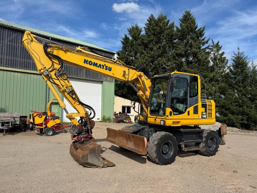 Komatsu PW 148-8 - Bager na kotačima: slika Komatsu PW 148-8 - Bager na kotačima Komatsu PW 148-8 - Bager na kotačima: slika Komatsu PW 148-8 - Bager na kotačima