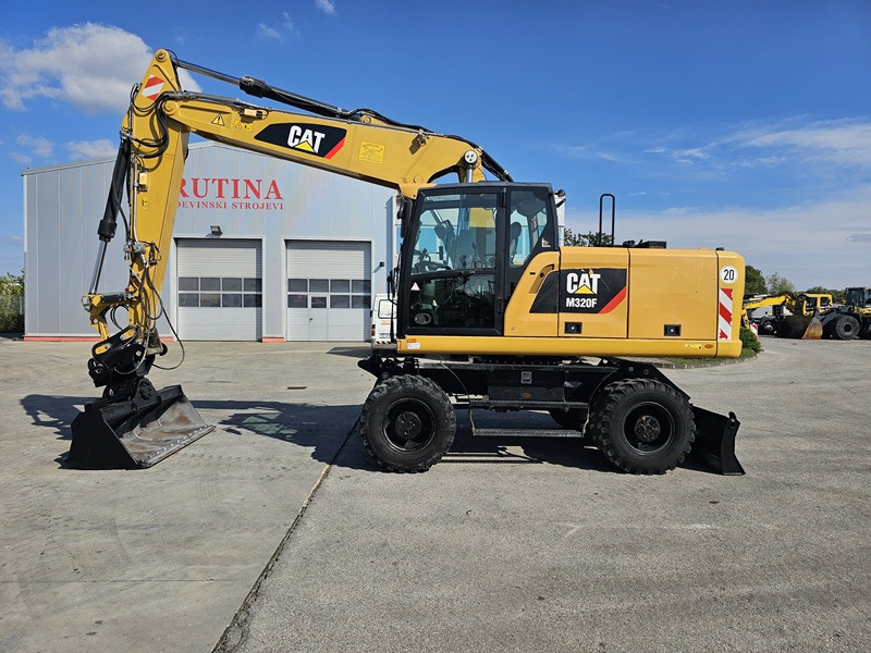 CATERPILLAR M320F - Bager na kotačima: slika CATERPILLAR M320F - Bager na kotačima CATERPILLAR M320F - Bager na kotačima: slika CATERPILLAR M320F - Bager na kotačima