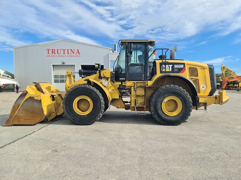 Caterpillar 966M XE - Utovarivač na kotačima: slika Caterpillar 966M XE - Utovarivač na kotačima Caterpillar 966M XE - Utovarivač na kotačima: slika Caterpillar 966M XE - Utovarivač na kotačima