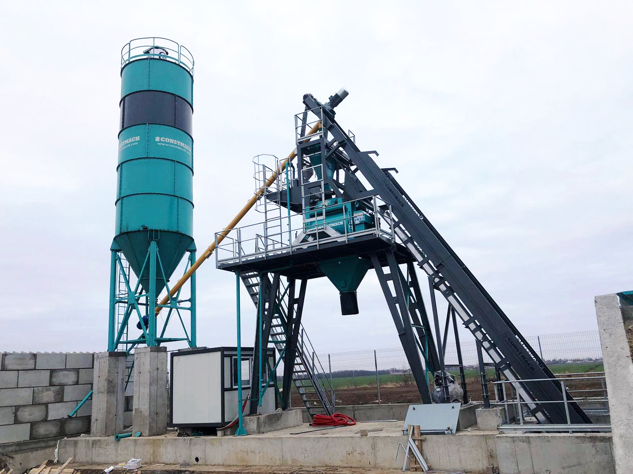 Constmach 60 m³/h Compact Concrete Batching Plant - Betonara: slika Constmach 60 m³/h Compact Concrete Batching Plant - Betonara Constmach 60 m³/h Compact Concrete Batching Plant - Betonara: slika Constmach 60 m³/h Compact Concrete Batching Plant - Betonara