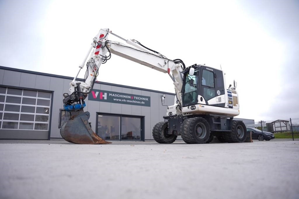 Komatsu PW 148-11 - Bager na kotačima: slika Komatsu PW 148-11 - Bager na kotačima Komatsu PW 148-11 - Bager na kotačima: slika Komatsu PW 148-11 - Bager na kotačima