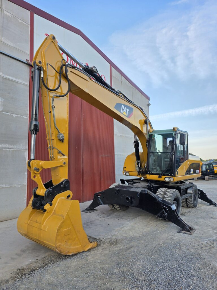 CAT M318D - Bager na kotačima: slika CAT M318D - Bager na kotačima CAT M318D - Bager na kotačima: slika CAT M318D - Bager na kotačima