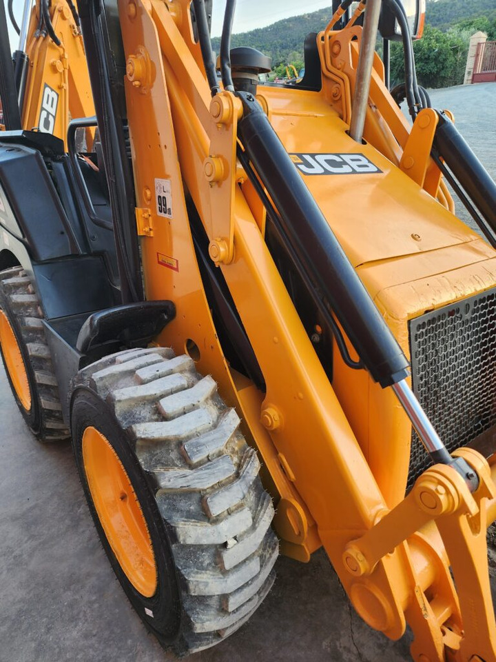 JCB 1CX - Mini bager: slika JCB 1CX - Mini bager JCB 1CX - Mini bager: slika JCB 1CX - Mini bager