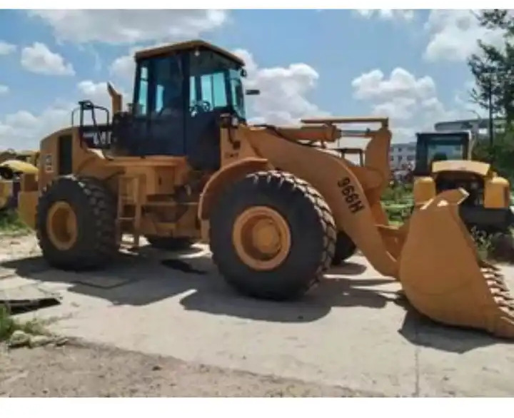 Cheap Used Japan Cat 966h Wheel Loader Second Hand Original Caterpillar 966 Pay Loader - Utovarivač na kotačima: slika Cheap Used Japan Cat 966h Wheel Loader Second Hand Original Caterpillar 966 Pay Loader - Utovarivač na kotačima Cheap Used Japan Cat 966h Wheel Loader Second Hand Original Caterpillar 966 Pay Loader - Utovarivač na kotačima: slika Cheap Used Japan Cat 966h Wheel Loader Second Hand Original Caterpillar 966 Pay Loader - Utovarivač na kotačima