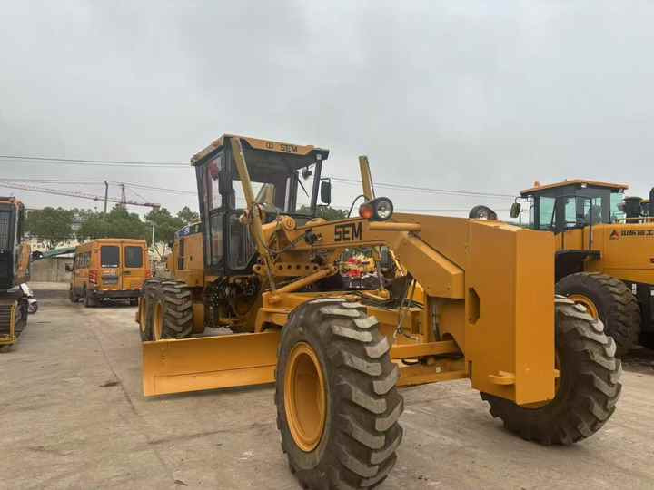 Second Hand SEM921 Motor Grader / Second Hand Motor Grader Sem 921 922 919 SEM Motor Grader for Sale - Grejder: slika Second Hand SEM921 Motor Grader / Second Hand Motor Grader Sem 921 922 919 SEM Motor Grader for Sale - Grejder Second Hand SEM921 Motor Grader / Second Hand Motor Grader Sem 921 922 919 SEM Motor Grader for Sale - Grejder: slika Second Hand SEM921 Motor Grader / Second Hand Motor Grader Sem 921 922 919 SEM Motor Grader for Sale - Grejder