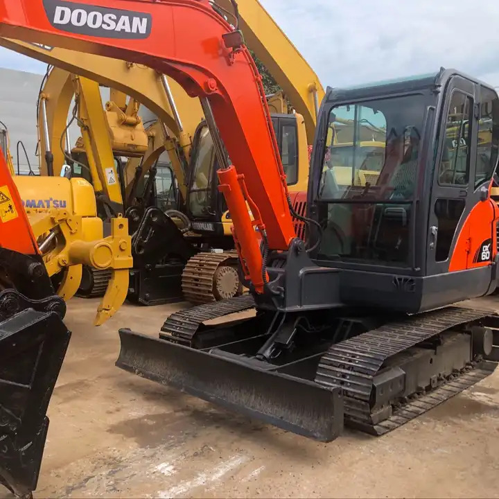 Used Doosan dx60 dh60 dx55 dh55 mini excavator 6 ton - Bager gusjeničar: slika Used Doosan dx60 dh60 dx55 dh55 mini excavator 6 ton - Bager gusjeničar Used Doosan dx60 dh60 dx55 dh55 mini excavator 6 ton - Bager gusjeničar: slika Used Doosan dx60 dh60 dx55 dh55 mini excavator 6 ton - Bager gusjeničar
