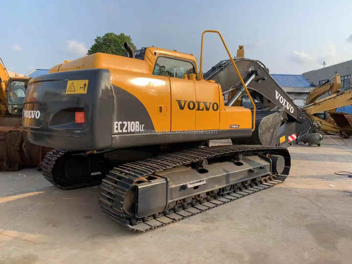 Used Original Volvo Excavator EC210B machinery in stock for sale with high quality and good price - Bager gusjeničar: slika Used Original Volvo Excavator EC210B machinery in stock for sale with high quality and good price - Bager gusjeničar Used Original Volvo Excavator EC210B machinery in stock for sale with high quality and good price - Bager gusjeničar: slika Used Original Volvo Excavator EC210B machinery in stock for sale with high quality and good price - Bager gusjeničar