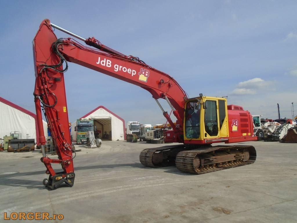 CAT 320 EL - Bager gusjeničar: slika CAT 320 EL - Bager gusjeničar CAT 320 EL - Bager gusjeničar: slika CAT 320 EL - Bager gusjeničar