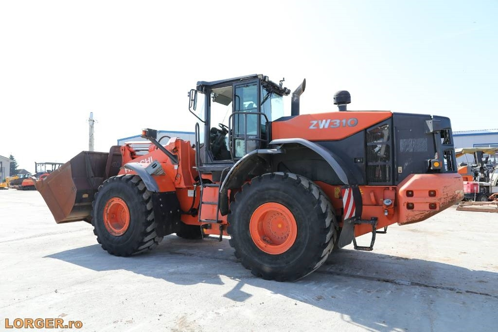 Hitachi ZW 310-5B - Utovarivač na kotačima: slika Hitachi ZW 310-5B - Utovarivač na kotačima Hitachi ZW 310-5B - Utovarivač na kotačima: slika Hitachi ZW 310-5B - Utovarivač na kotačima