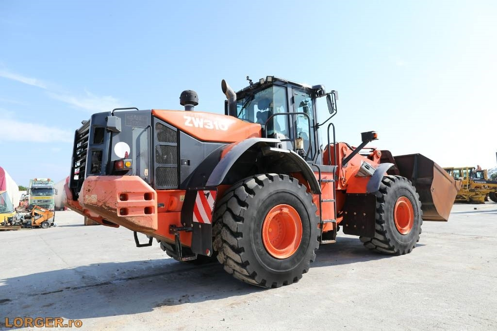 Hitachi ZW 310-5B - Utovarivač na kotačima: slika Hitachi ZW 310-5B - Utovarivač na kotačima Hitachi ZW 310-5B - Utovarivač na kotačima: slika Hitachi ZW 310-5B - Utovarivač na kotačima