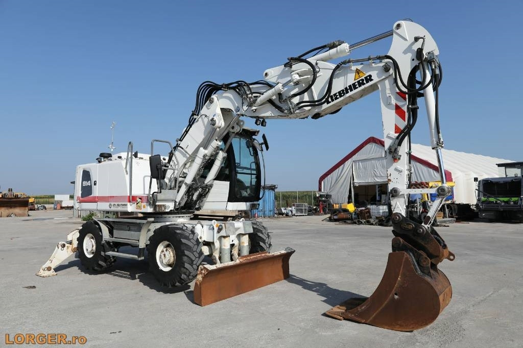 Liebherr A 914 - Bager na kotačima: slika Liebherr A 914 - Bager na kotačima Liebherr A 914 - Bager na kotačima: slika Liebherr A 914 - Bager na kotačima