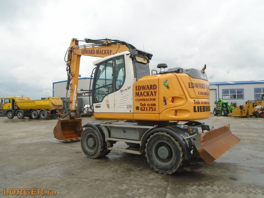 Liebherr A 914 - Bager na kotačima: slika Liebherr A 914 - Bager na kotačima Liebherr A 914 - Bager na kotačima: slika Liebherr A 914 - Bager na kotačima