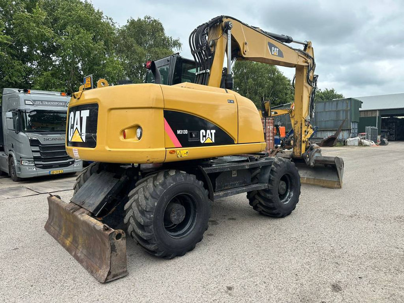 Cat M 313 D - Bager na kotačima: slika Cat M 313 D - Bager na kotačima Cat M 313 D - Bager na kotačima: slika Cat M 313 D - Bager na kotačima
