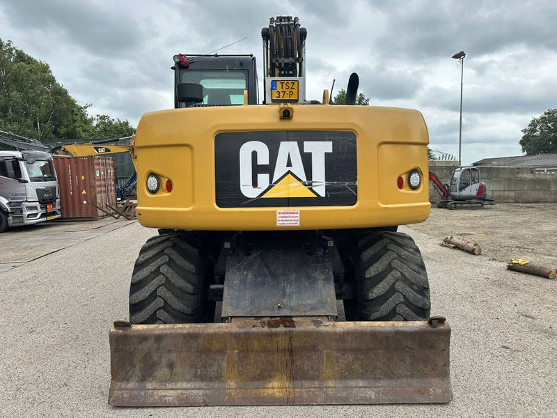 Cat M 313 D - Bager na kotačima: slika Cat M 313 D - Bager na kotačima Cat M 313 D - Bager na kotačima: slika Cat M 313 D - Bager na kotačima