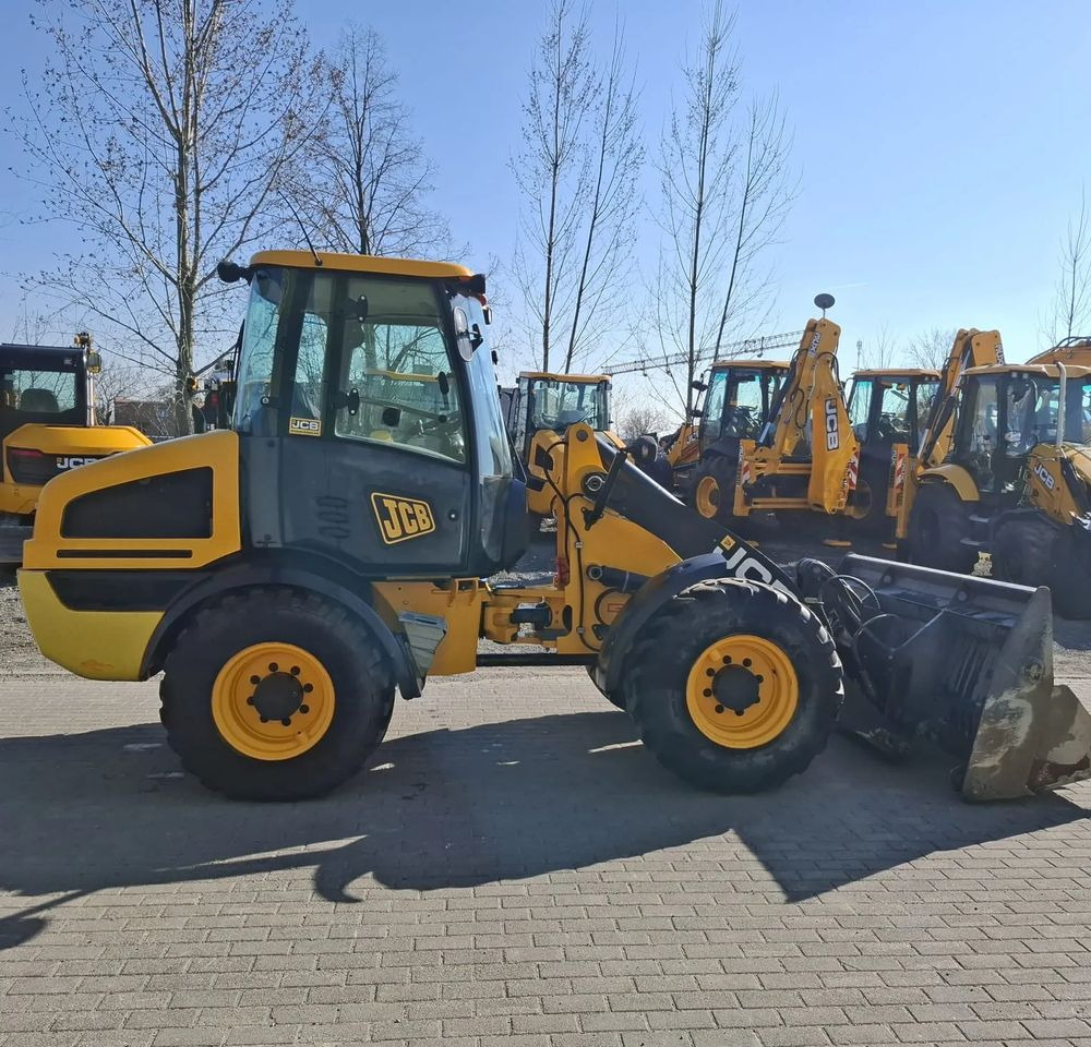 JCB 409 - Bager na kotačima: slika JCB 409 - Bager na kotačima JCB 409 - Bager na kotačima: slika JCB 409 - Bager na kotačima