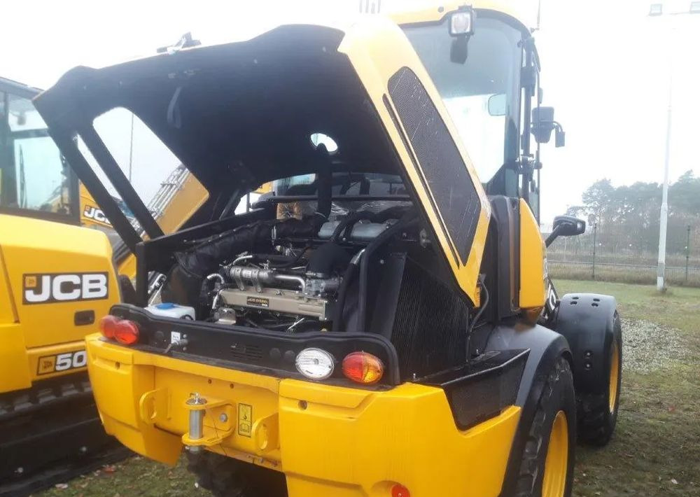 JCB WLS 409 - Utovarivač na kotačima: slika JCB WLS 409 - Utovarivač na kotačima JCB WLS 409 - Utovarivač na kotačima: slika JCB WLS 409 - Utovarivač na kotačima